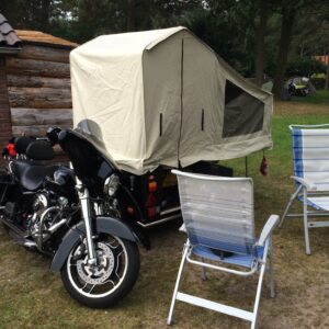 Mini-camp behind car and/or motorbike